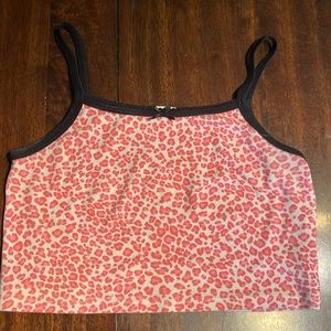 Brandy Melville pink leopard print tank top with a little bow on the top.